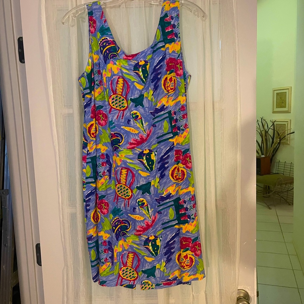 Cute, summery sun dress. Zips up the back. Great condition.